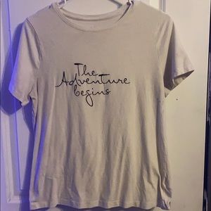 A white graphic t-shirt. With a cute quote.